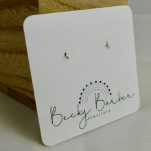 Load image into Gallery viewer, Tiny Four Point Star Sterling Silver Studs
