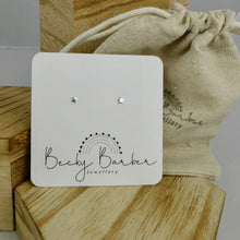 Load image into Gallery viewer, Micro Star Sterling Silver Studs