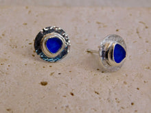 Load image into Gallery viewer, Mid Blue Sea Glass Hammered Sterling Silver Studs
