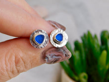 Load image into Gallery viewer, Mid Blue Sea Glass Hammered Sterling Silver Studs
